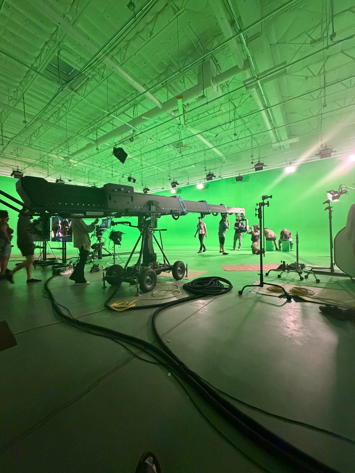 Wide view of the ABQ Castle Studios virtual production stage during a telescoping-crane setup