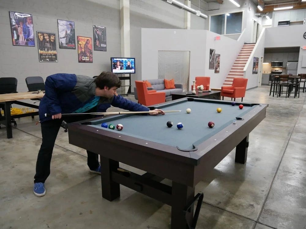 The studio lounge with a pool table at the Burbank facility