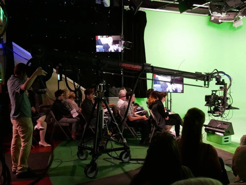 Crew operating the camera crane on the Burbank virtual production stage