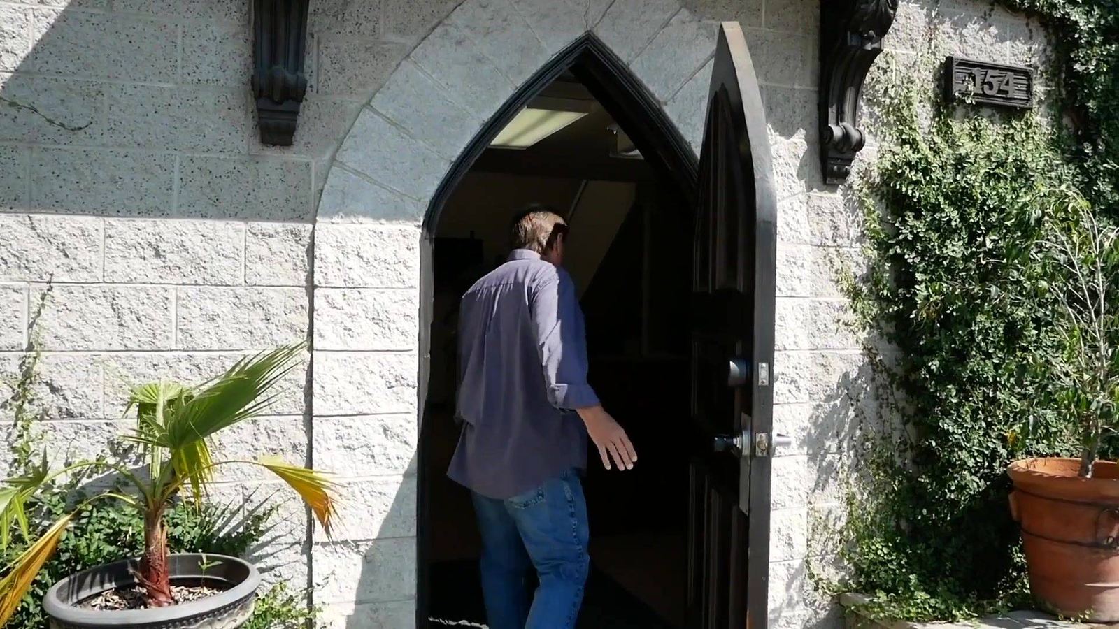 The arched castle front door of the L.A. Castle Studios press junket venue on S. Victory Blvd in Burbank