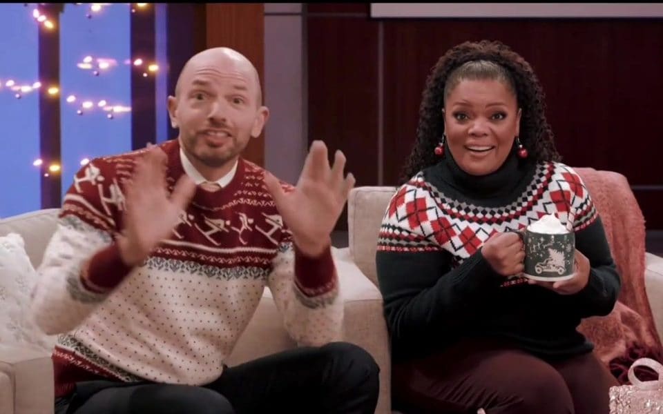 Two hosts on a holiday living-room virtual set in the T-Mobile national spot shot at L.A. Castle Studios