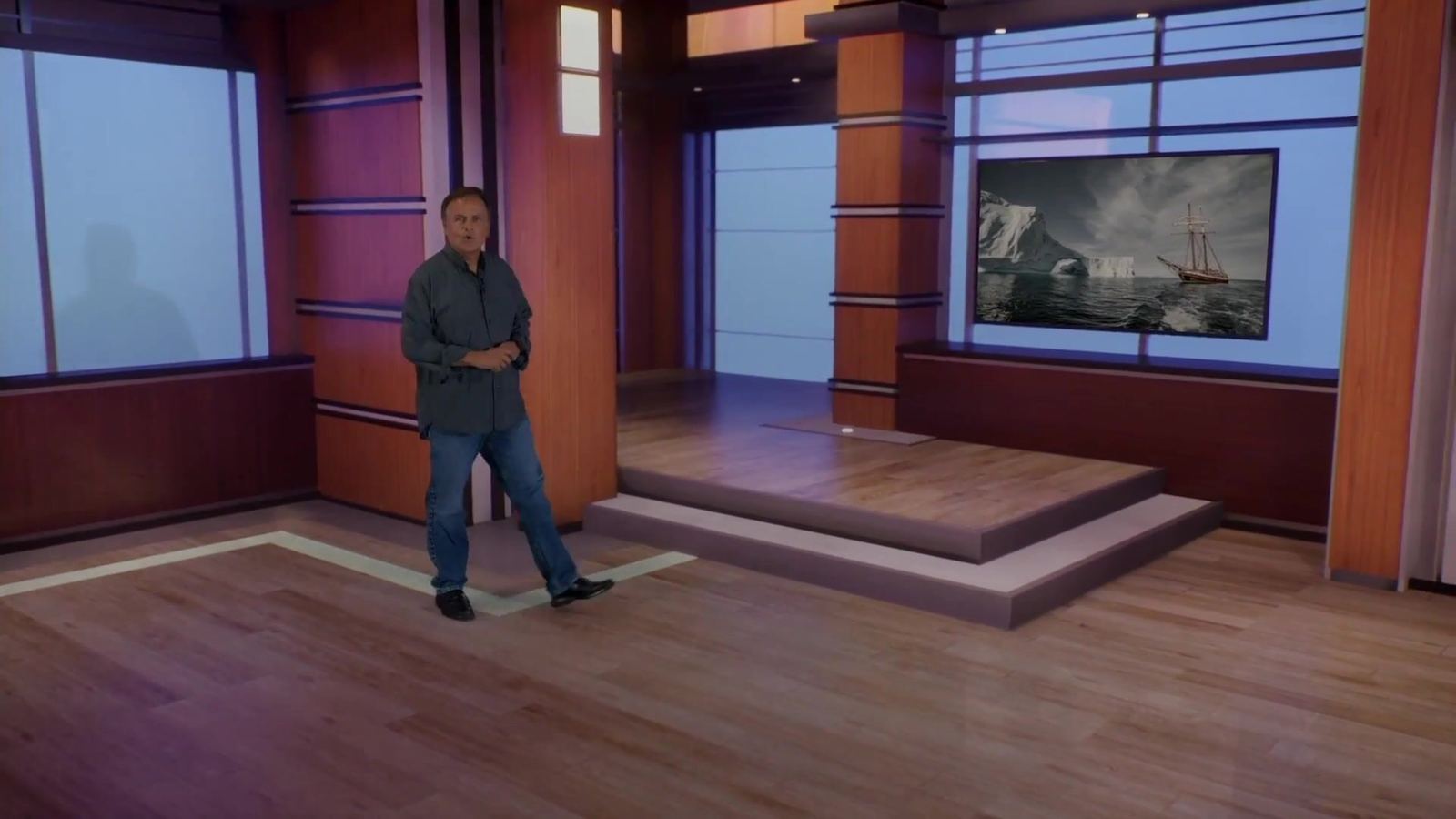 A presenter inside a photoreal virtual set composited live in camera at the virtual production studio in Burbank, Los Angeles