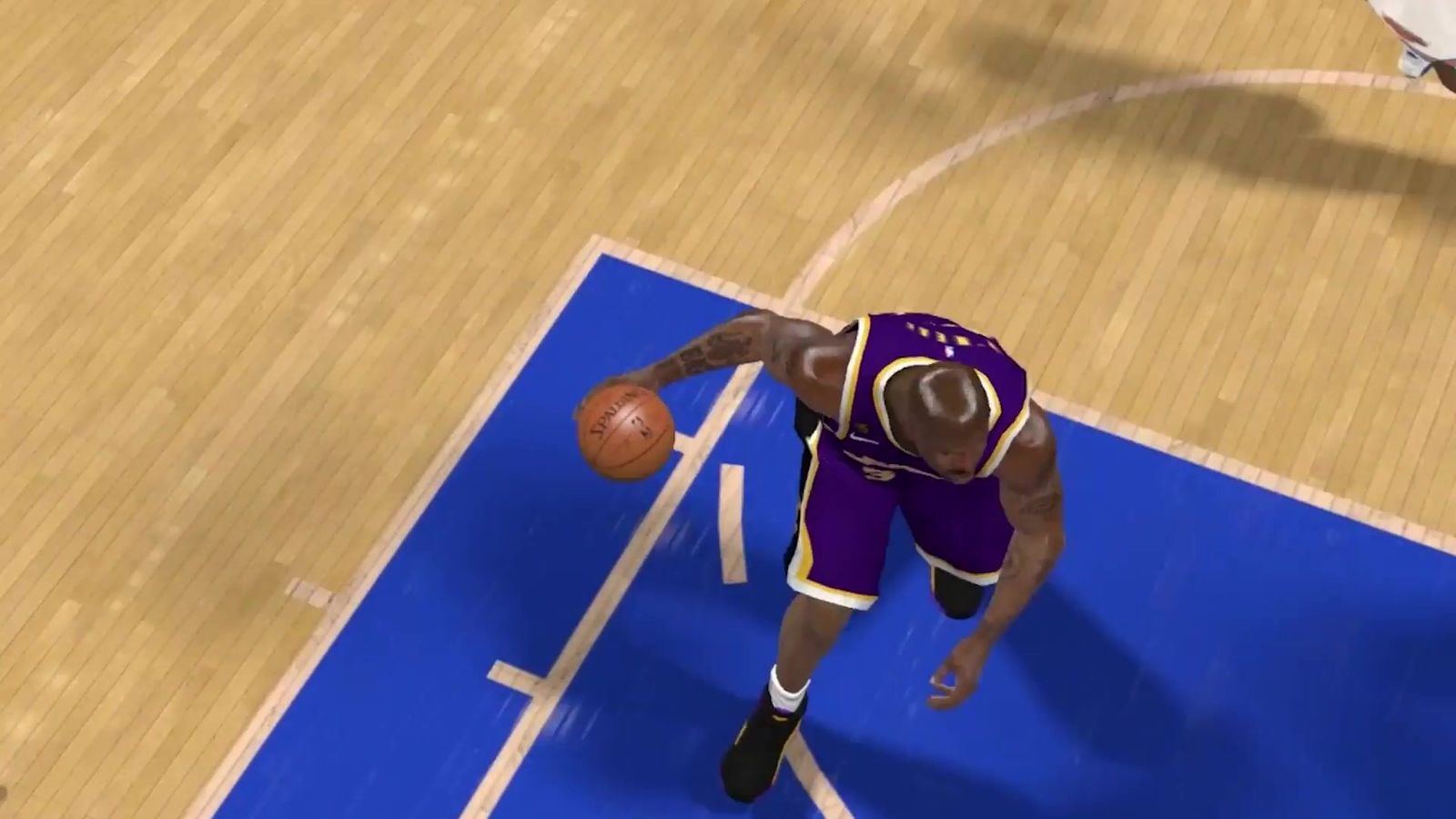 Commercial: overhead NBA 2K game footage of a player driving to the basket, from an NBA 2K spot, L.A. & ABQ Castle Studios