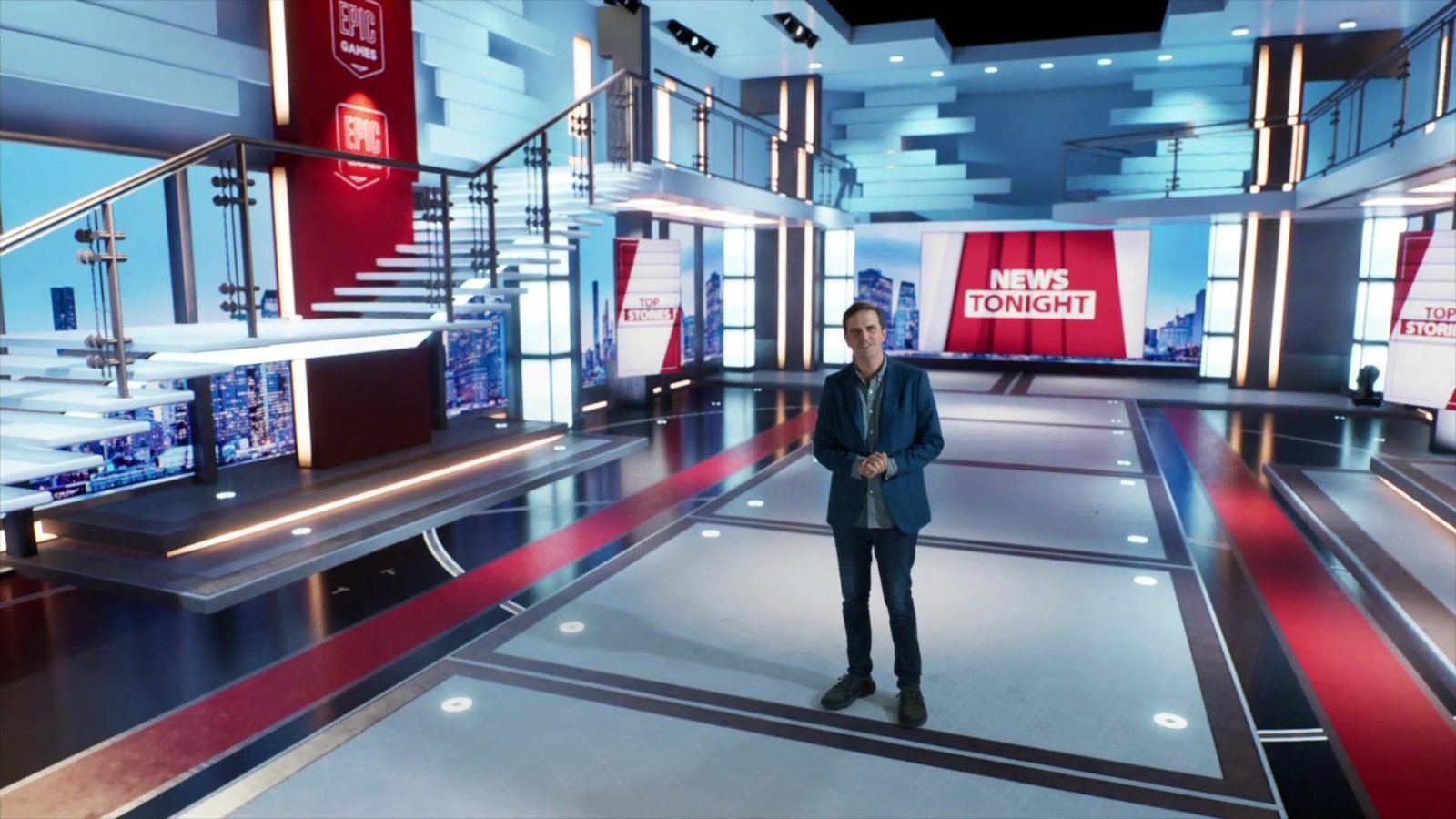 News set: a presenter in the Upscale Talk Show & News Sets newsroom, with a glass staircase, a balcony and News Tonight screens, composited live at L.A. & ABQ Castle Studios