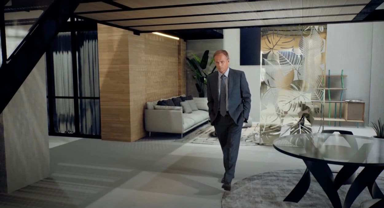 Unreal Engine set — an actor in a suit walks through a designer open-plan loft, a virtual production set at L.A. & ABQ Castle Studios